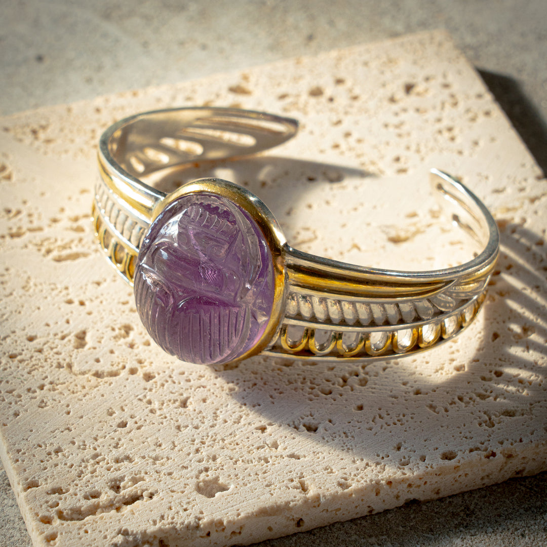 Amethyst Scarab Bangle Egyptian-inspired jewellery featuring carved scarabs, Ankhs, and divine motifs – handcrafted silver and gold designs echoing the mysticism of ancient Egypt