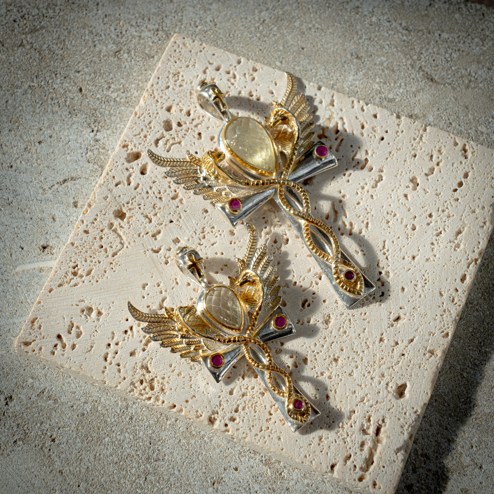 Gold Tektite Osiris Flame Ankh Caduceus Egyptian-inspired silver jewellery featuring carved scarabs, Ankhs, and divine motifs – handcrafted silver and gold designs echoing the mysticism of ancient Egypt