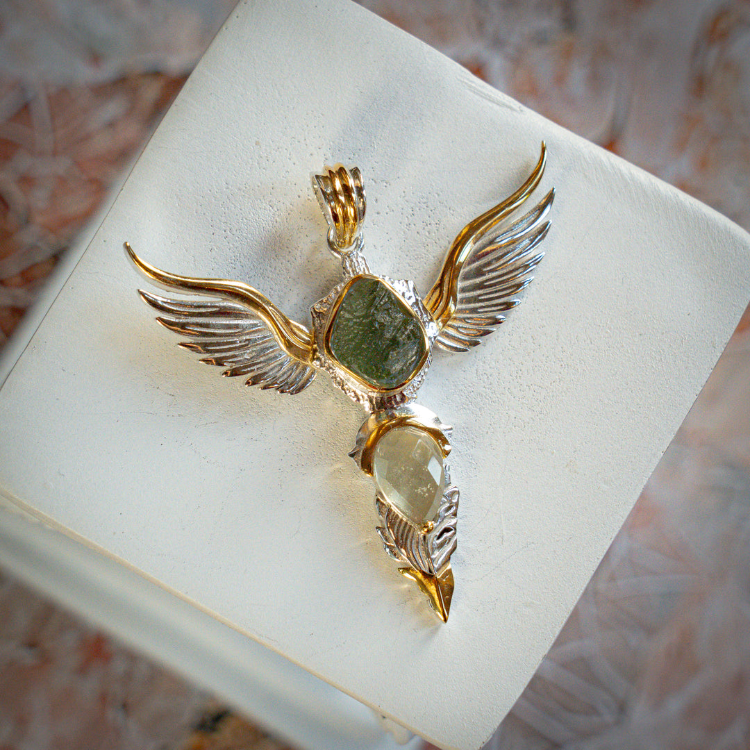 moldavite gold tektite silver gold jewellery pendant wings spiritual angel angelic talisman faceted golden green beautiful goddess 